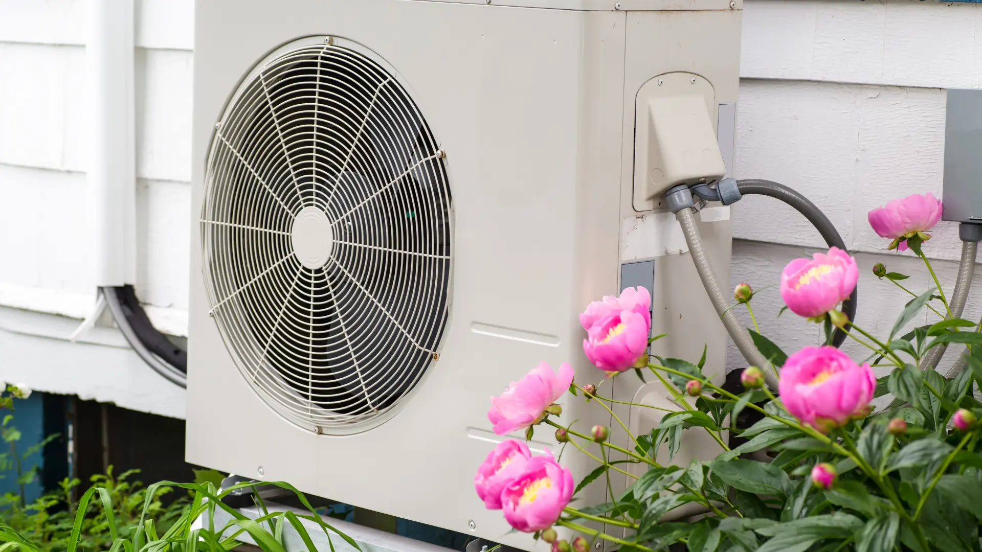 Air source heat pump installed outside a Merseyside home